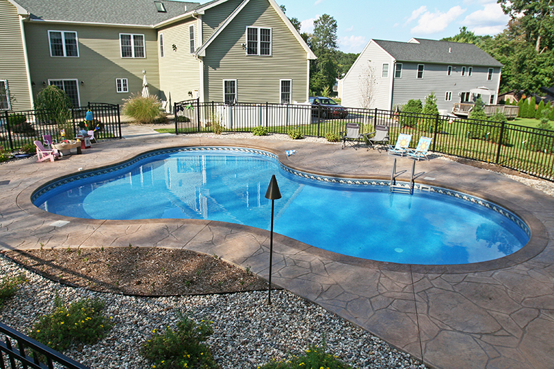 Swimming pool and stamped concrete project example 215